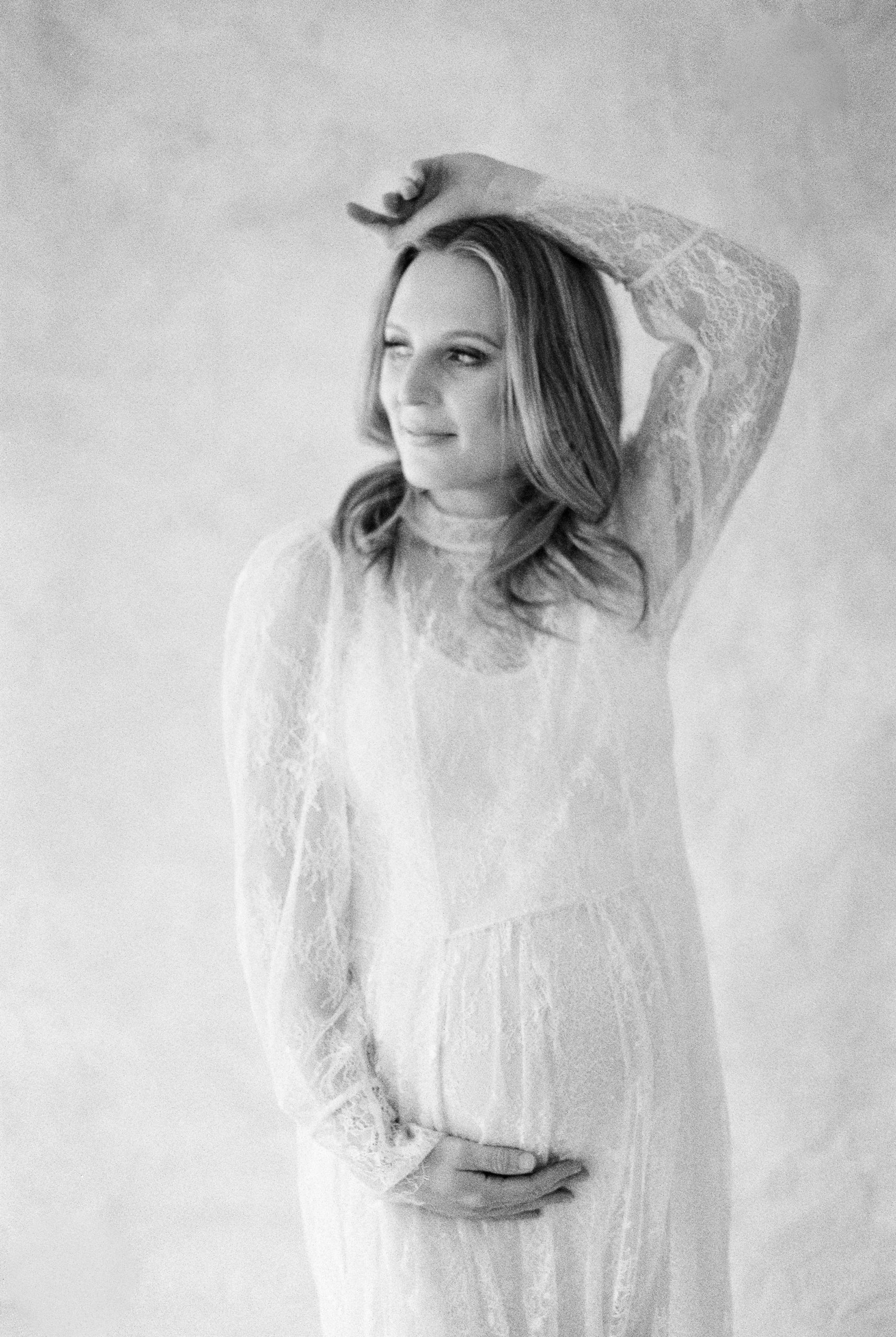 black and white film image of expectant mom in Edmonton