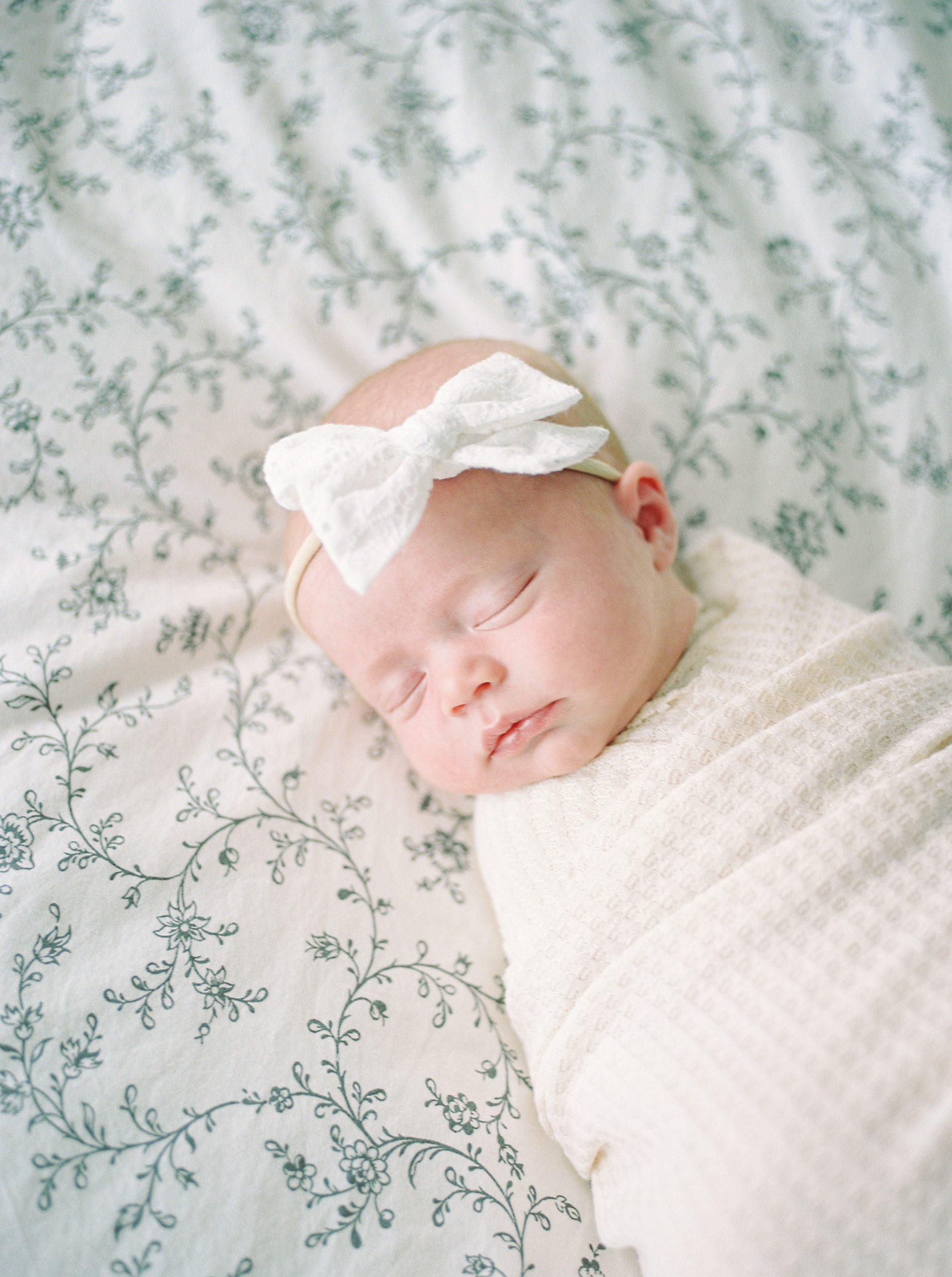 Natural light image of newborn baby captured on film by Edmonton newborn photographer, Kahla Kristen Photography
