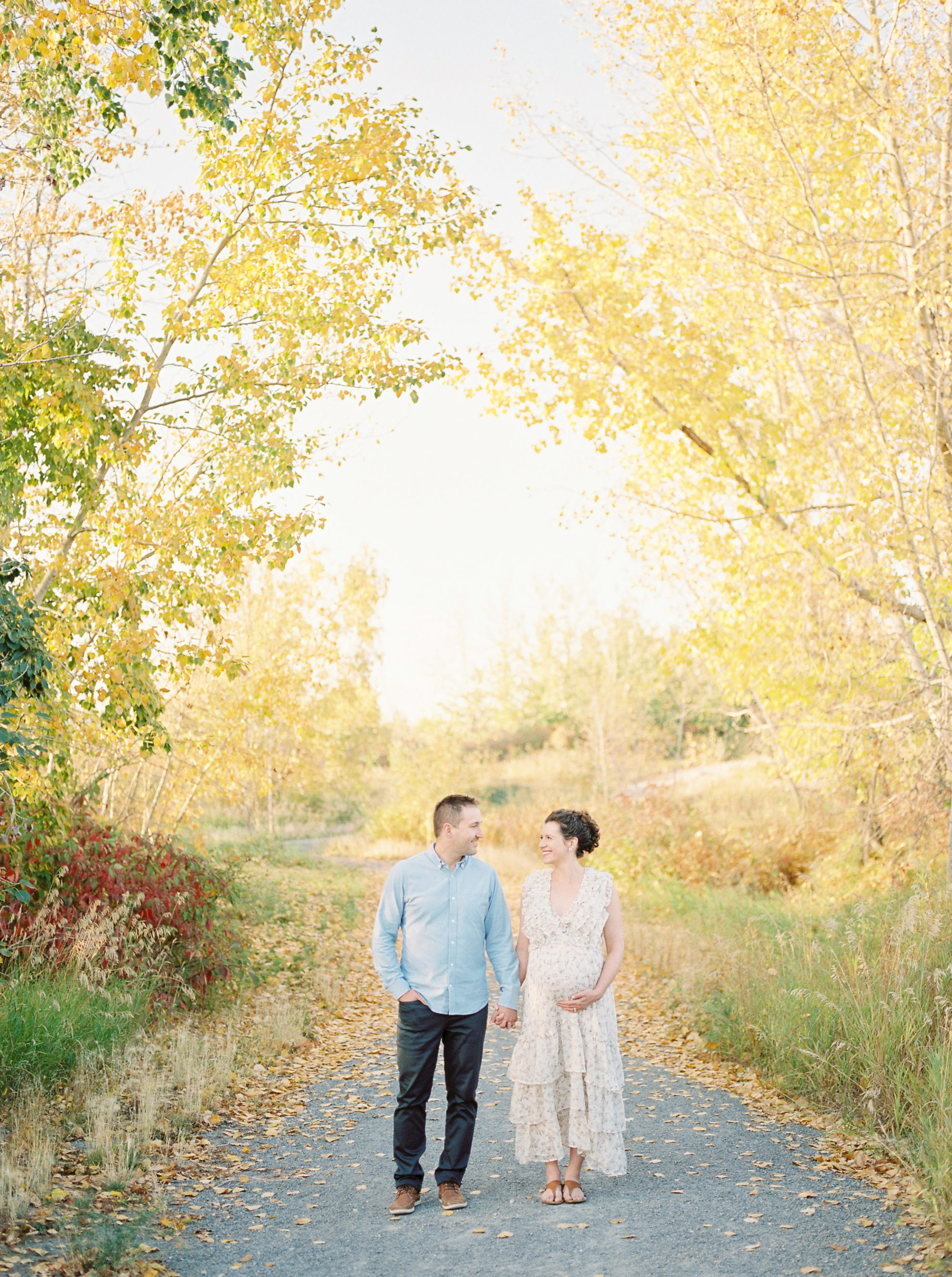 Edmonton Maternity Photographer capturing mom and dad in fall colours