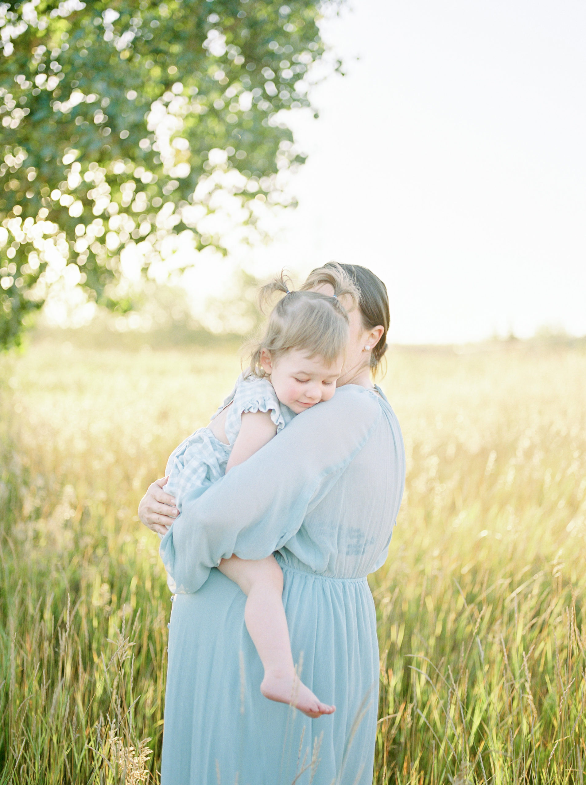 Outdoor Edmonton Maternity Photography Session with expectant mom and toddler